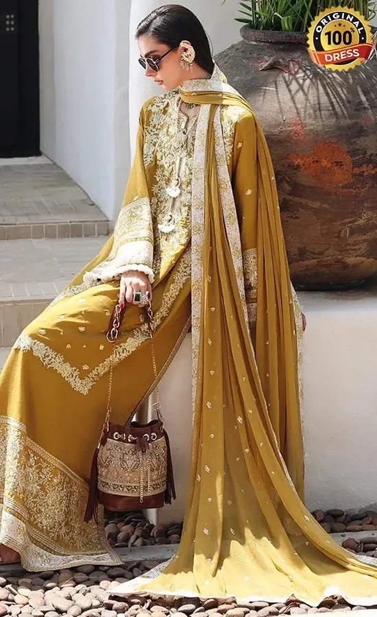 Mustard yellow raw silk salwar kameez with sequinned embroidery and chatta patti detailing
