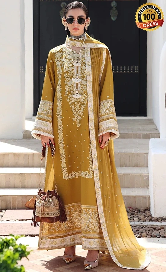 Mustard yellow salwar kameez for wedding guests with elegant embroidery and traditional detailing