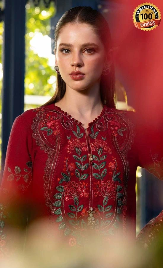 Pakistani red salwar suit for wedding guests with small pearl embellishments and detailed embroidery