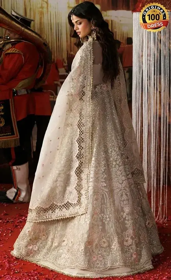 Embroidered white maxi dress for wedding guests from Singhar Wedding Formals