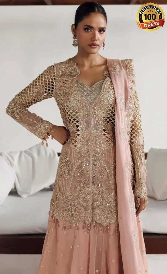Embroidered peach lehenga for wedding guests from Shehnai Wedding Formals 26