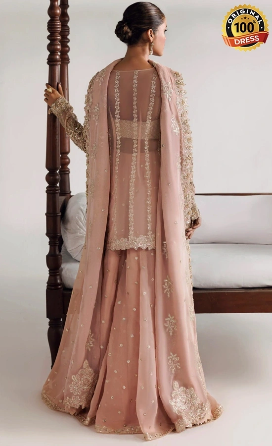 Pakistani peach lehenga for wedding guests with embroidered organza, chiffon and graceful formal styling