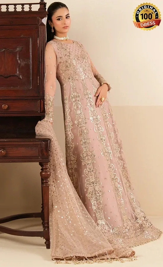 Light pink maxi dress for wedding guests with elegant hand embroidery and delicate detailing