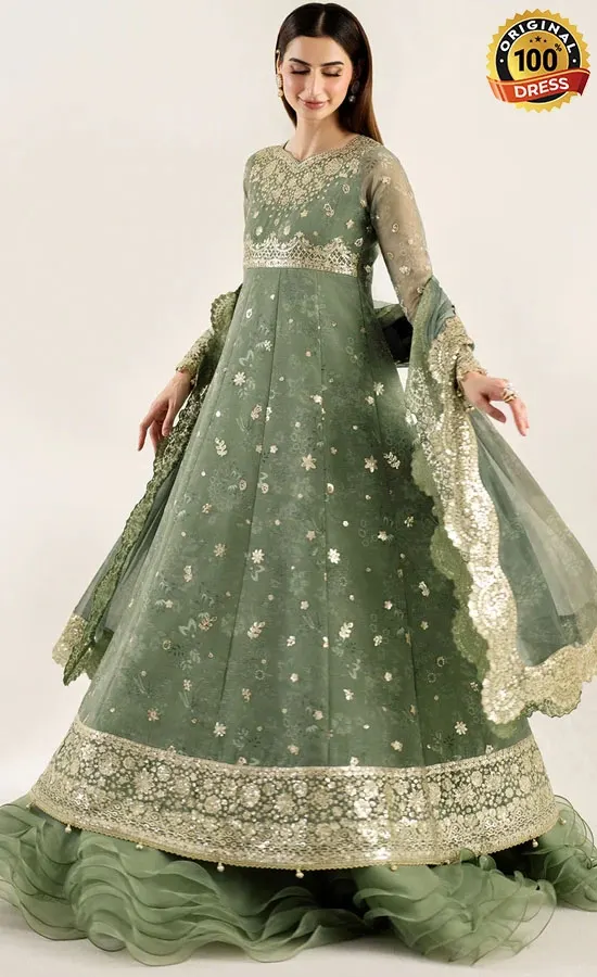 Embroidered green maxi dress with tassels, samosa lace and detailed hand finishing