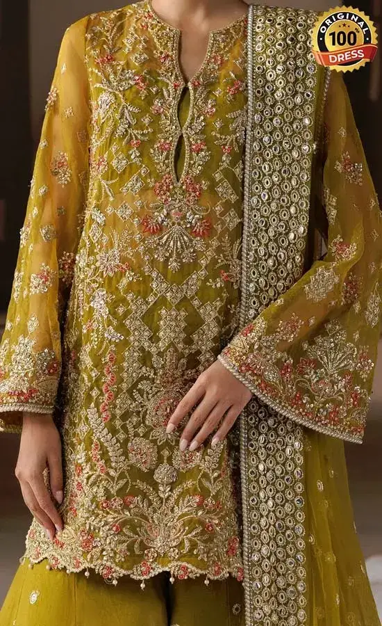 Pakistani lehenga with long blouse for wedding guests with embellished detailing and a graceful traditional look