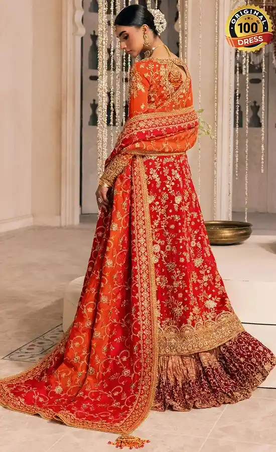 Embroidered orange bridesmaid gown for wedding guests from Zircon Collections 2025