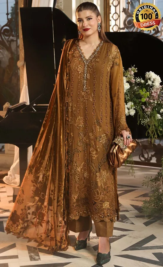 Golden color salwar suit for wedding guests with elegant hand embroidery and traditional detailing