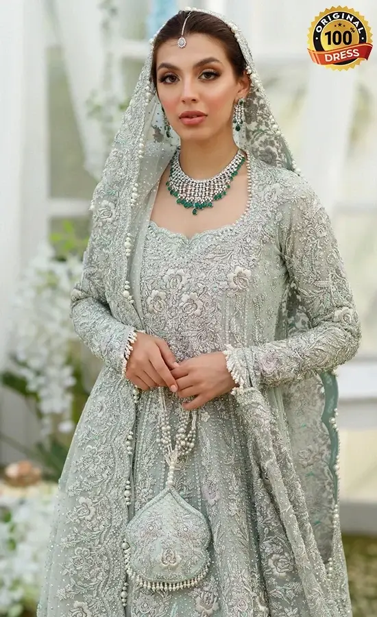 Embroidered aqua bridal frock with lehenga featuring handcrafted embellishments and traditional Pakistani bridal styling