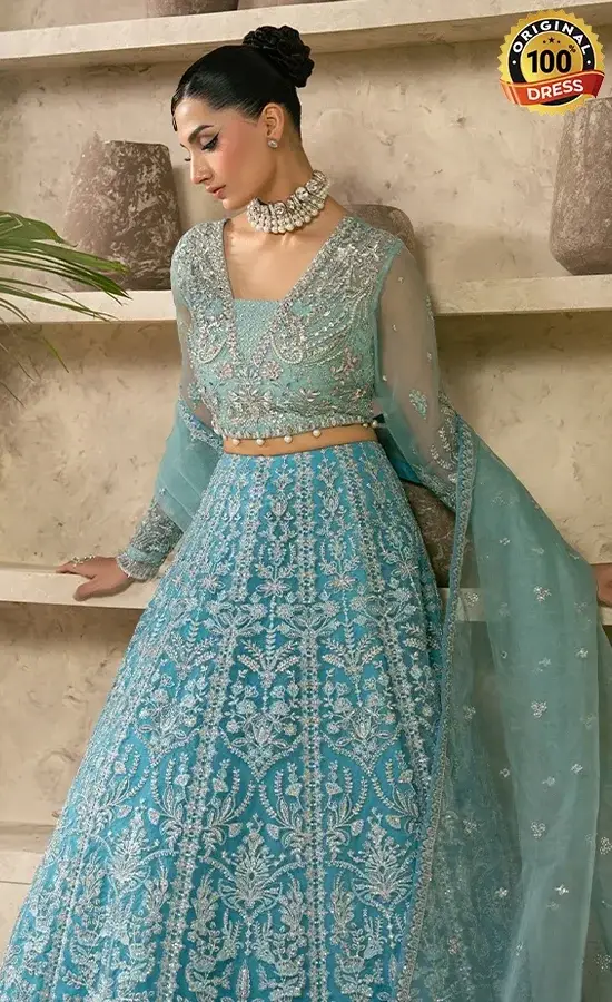 Teal organza lehenga dress with hand embroidery and graceful formal styling