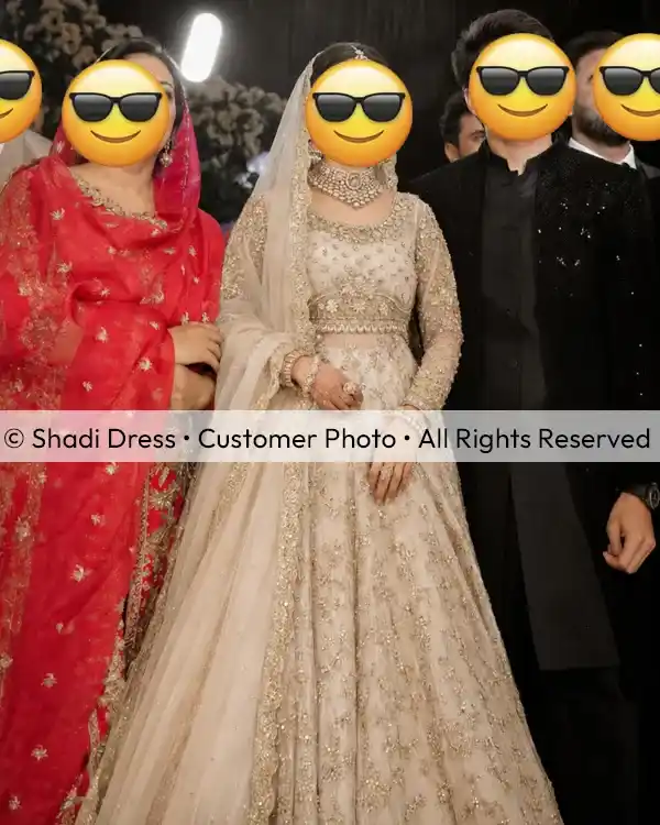 Real Shadi Dress bride wearing an ivory embroidered Pakistani bridal dress with matching dupatta at her wedding event.