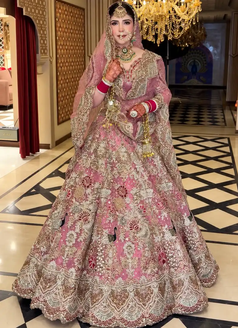 Baby Pink Bridal Lehenga with Crystal Dabka Work Baby pink bridal lehenga featuring multicolour crystal dabka work and elegant traditional detailing