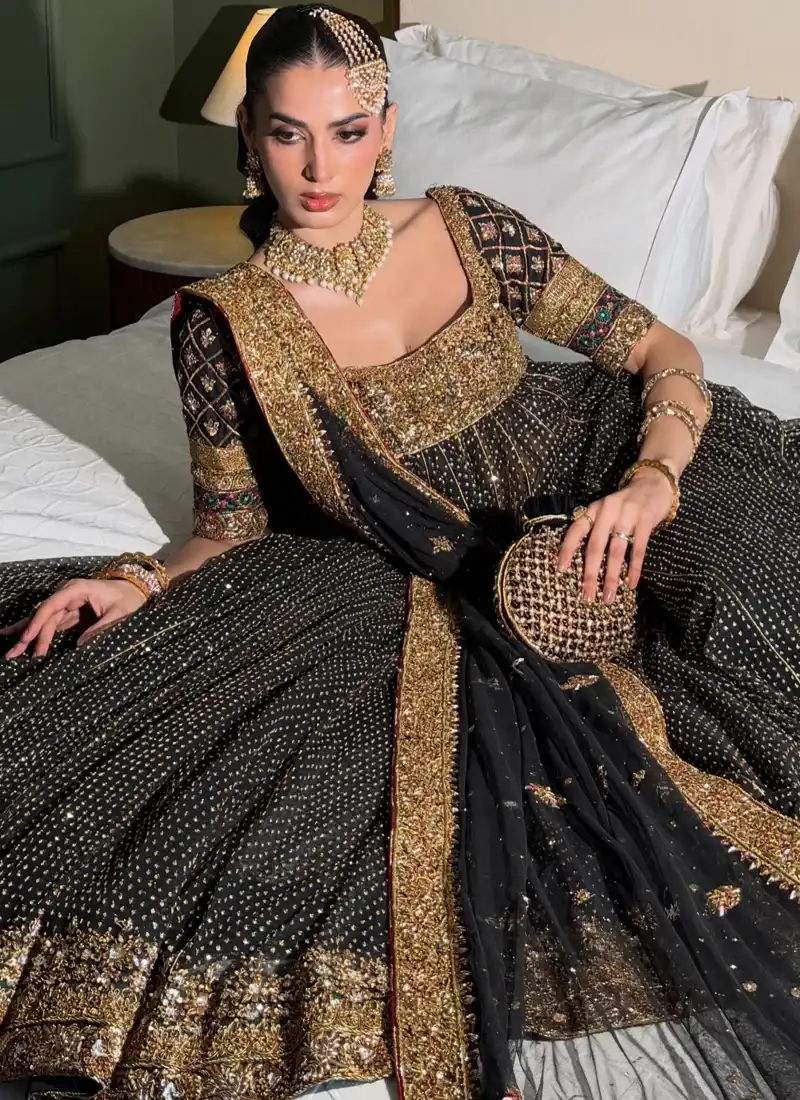 Black bridal Pishwas in chiffon with gold, rose-gold, silver and multicolor embroidery, Katan silk trousers and organza dupatta