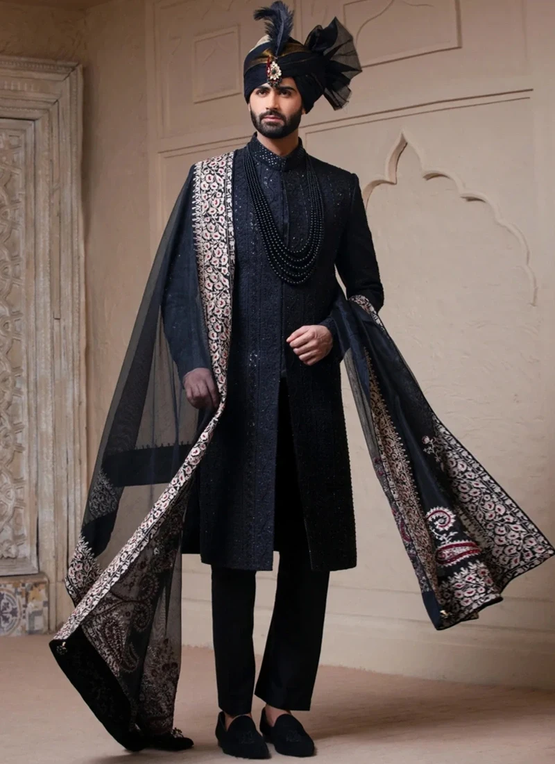 Black sherwani with matching black shawl and turban for groom wedding wear