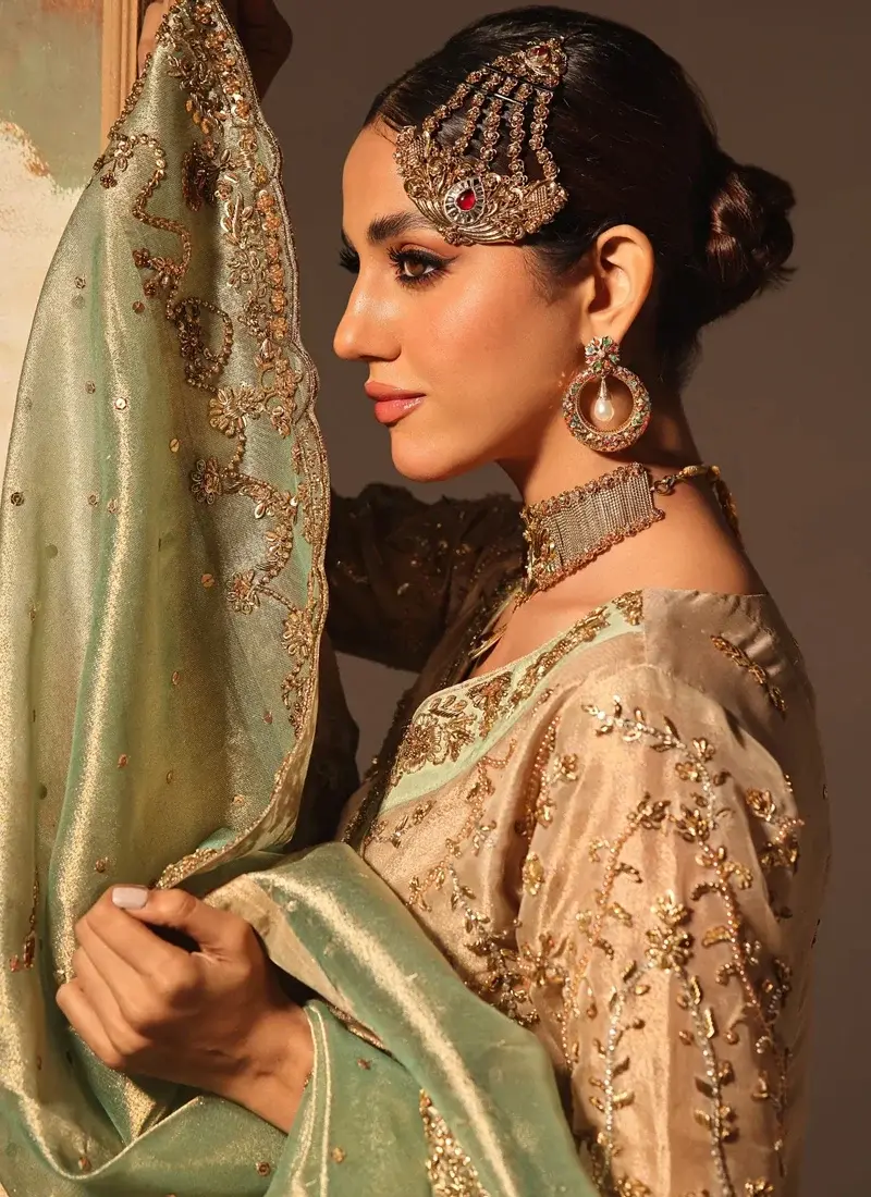 Champagne gold Angrakha with a panelled silk-lined shirt, closed back and mint-and-gold detailing