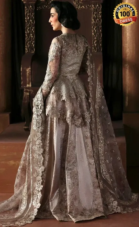 Champagne lehenga for wedding guests with elegant hand embroidery and traditional detailing