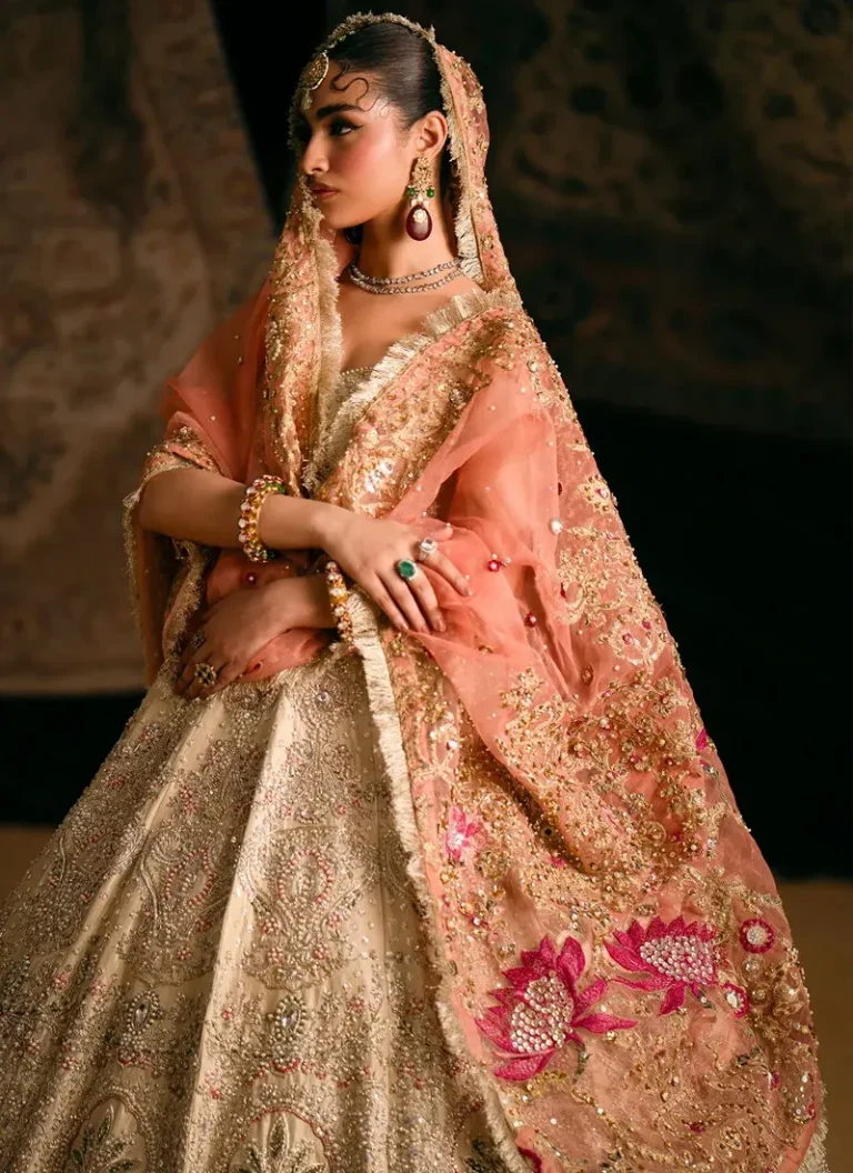 Embroidered ivory bridal lehenga with traditional Eastern bridal detailing and handcrafted embellishments