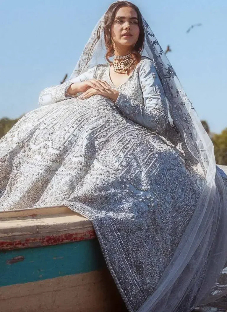 Ice blue maxi for Nikah ceremony with intricate hand embroidery and graceful bridal styling