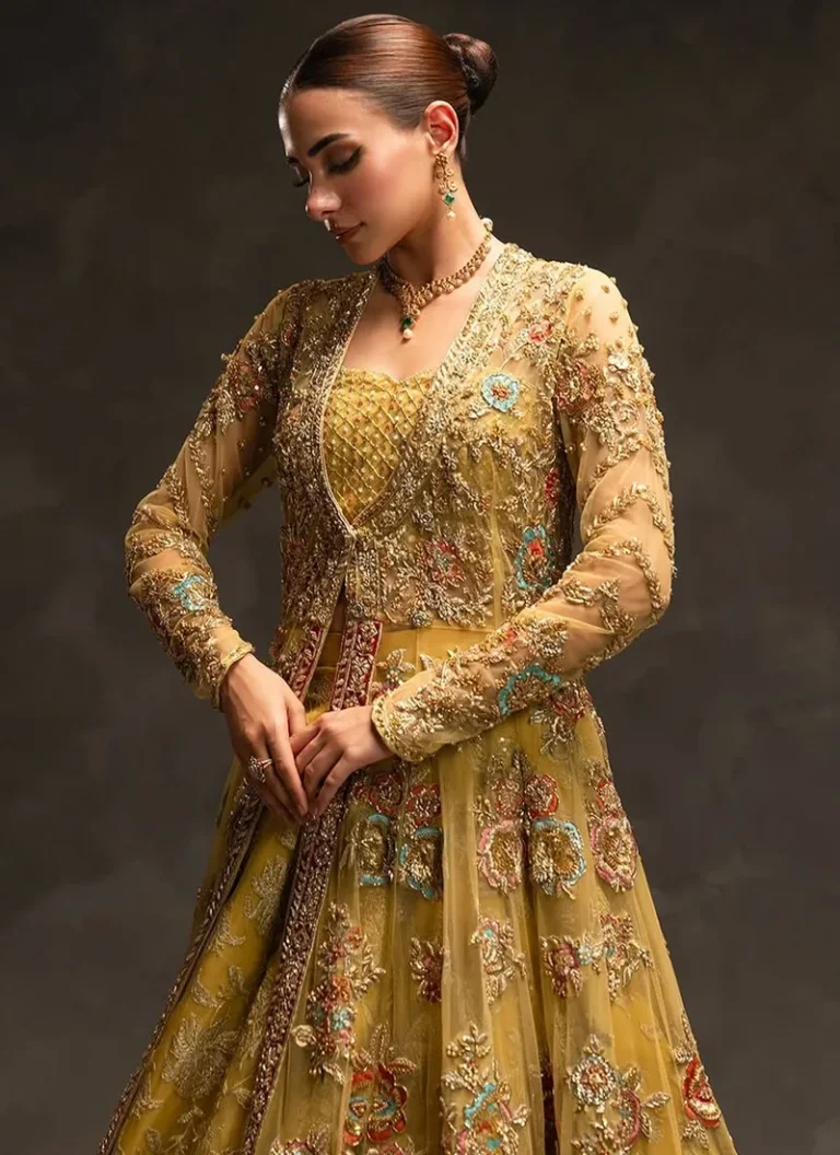Mehndi lehenga for Nikkah ceremony with intricate hand embroidery and graceful bridal styling