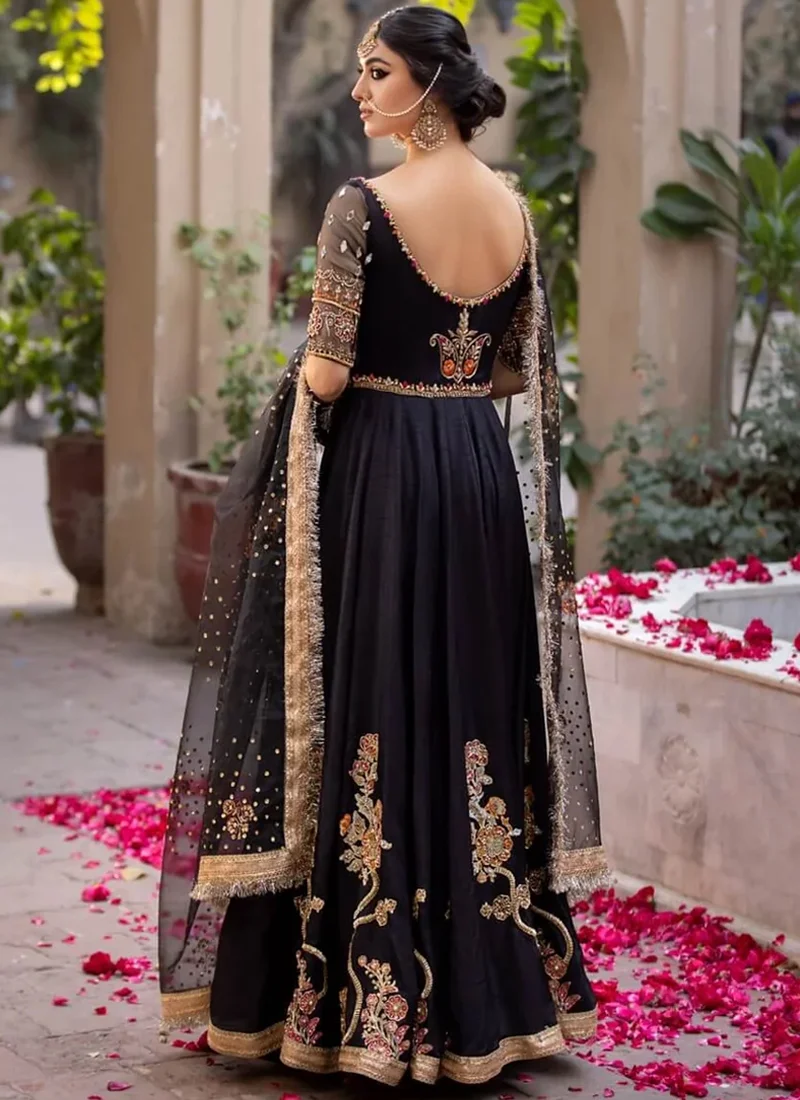 Black pishwas full front view with gold climbing floral vines and a sheer organza dupatta