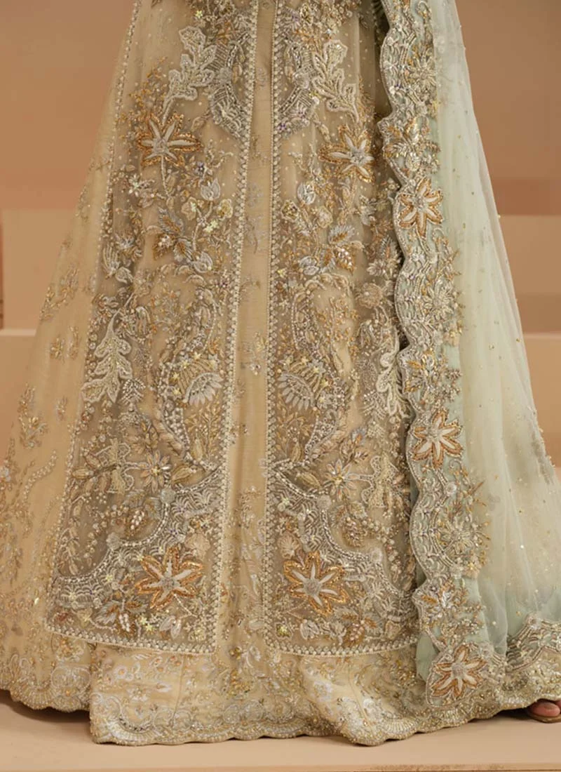 Ivory long shirt and lehenga rear view with floral embroidery, full sleeves and a scalloped hem
