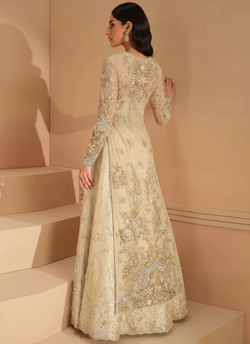 Ivory front-open long shirt with lehenga, gold floral panels and a sheer embroidered dupatta