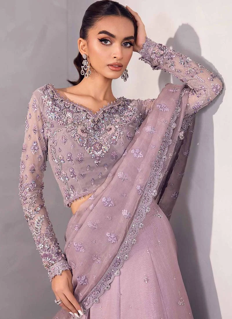 Lilac lehenga saree full-length front view with a flared skirt and floral garland hem embroidery