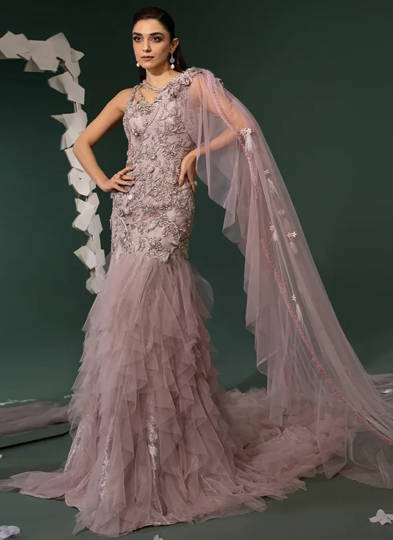 Dusty mauve sleeveless mermaid gown front view, with a beaded keyhole neckline and layered tulle skirt