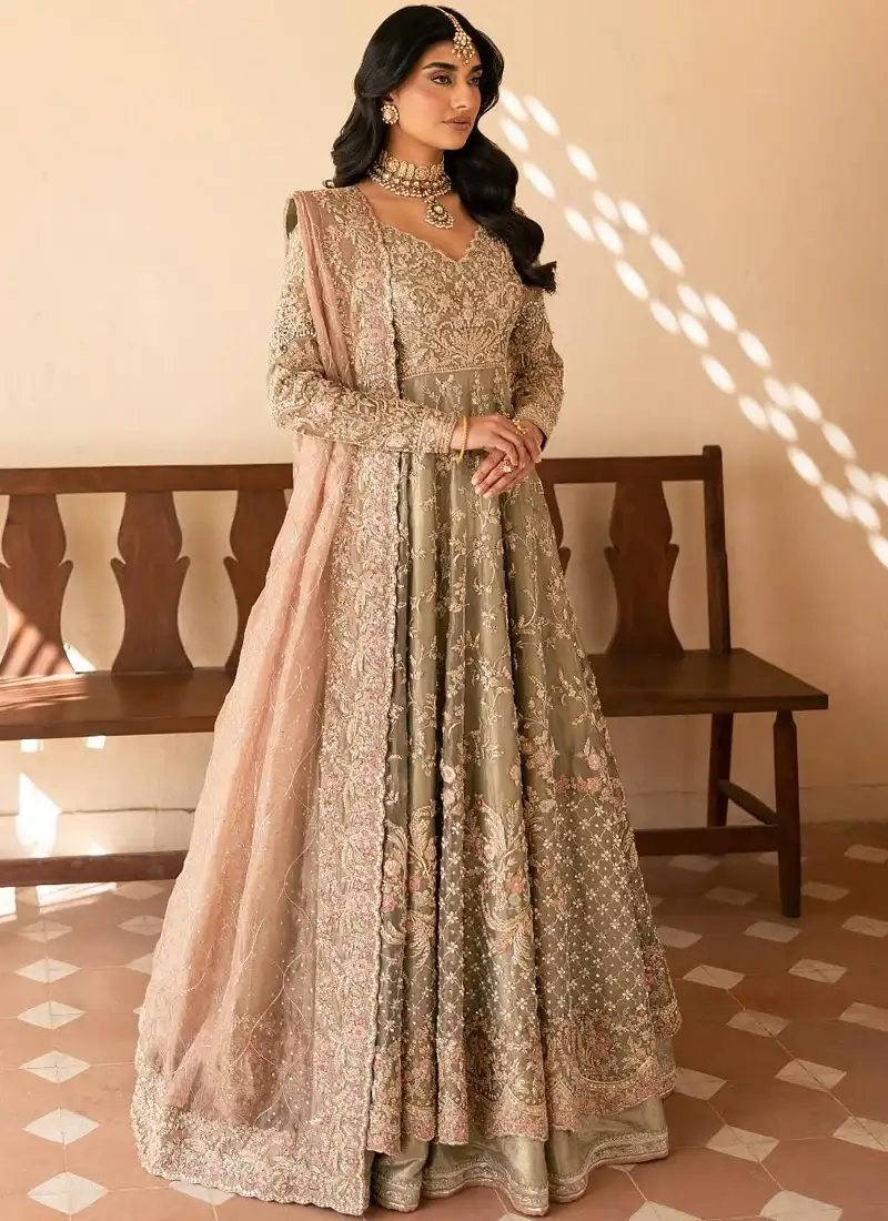 Olive walima pishwas with lehenga in full-length front view with gold floral embroidery and pink dupatta